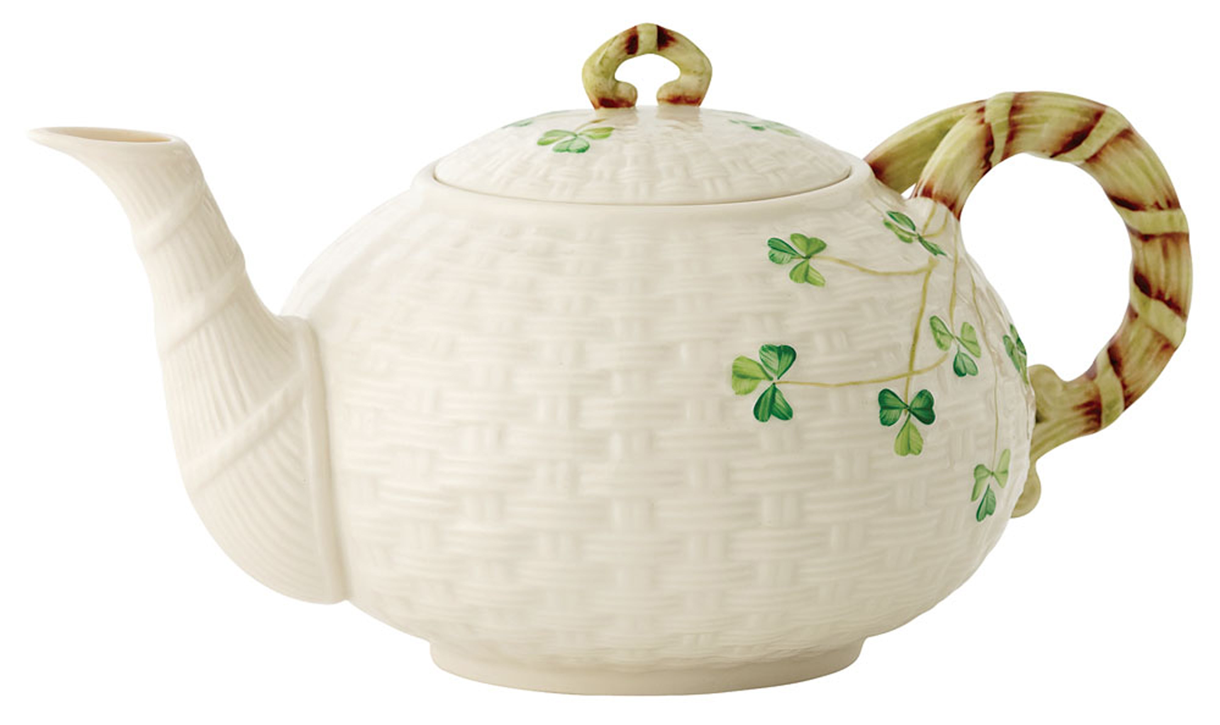 Decorative teapot with shamrock design on a white background