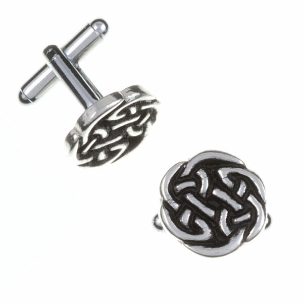 Silver cufflinks with intricate Celtic knot design on a white background