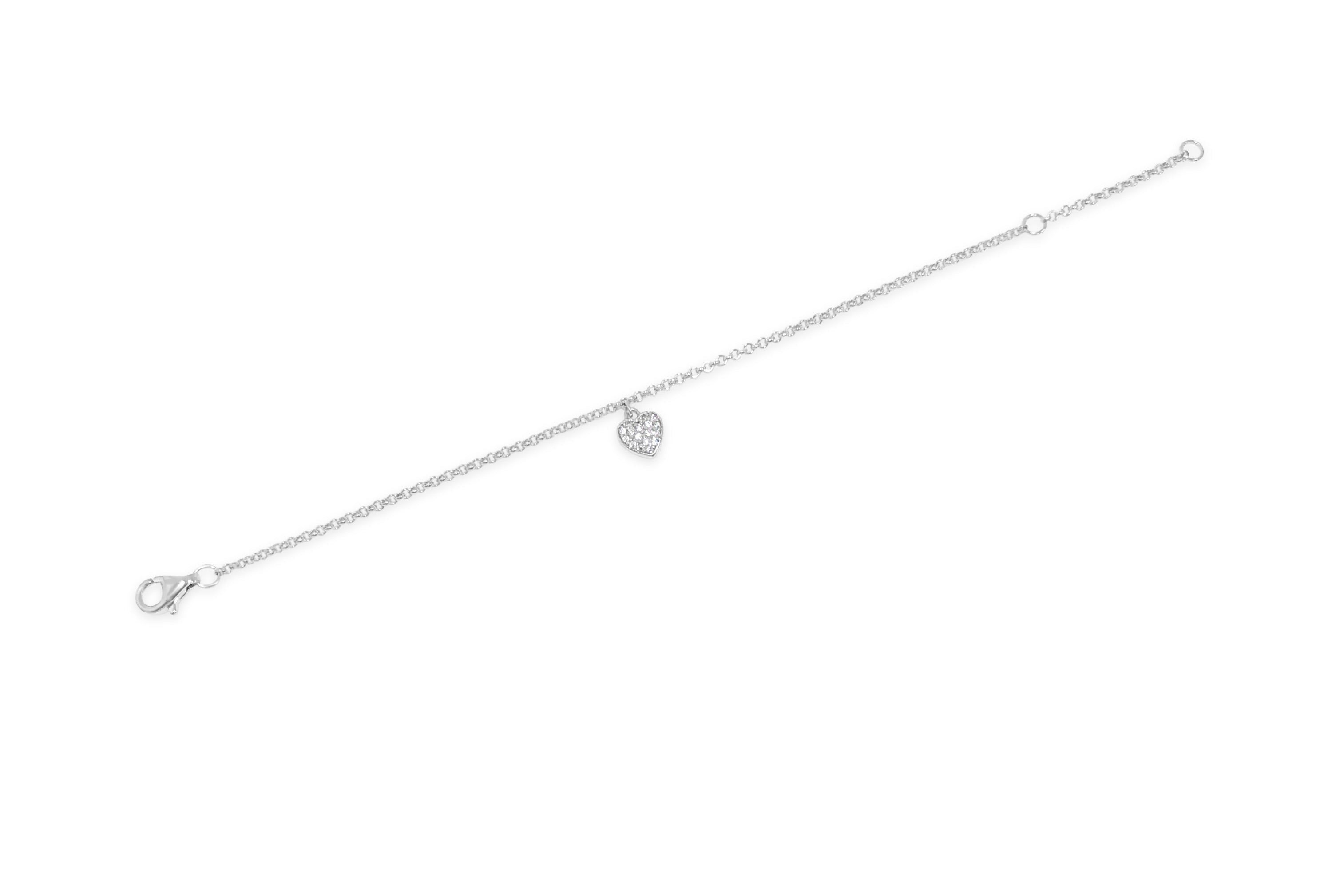 Silver kids bracelet with a heart-shaped charm on a white background