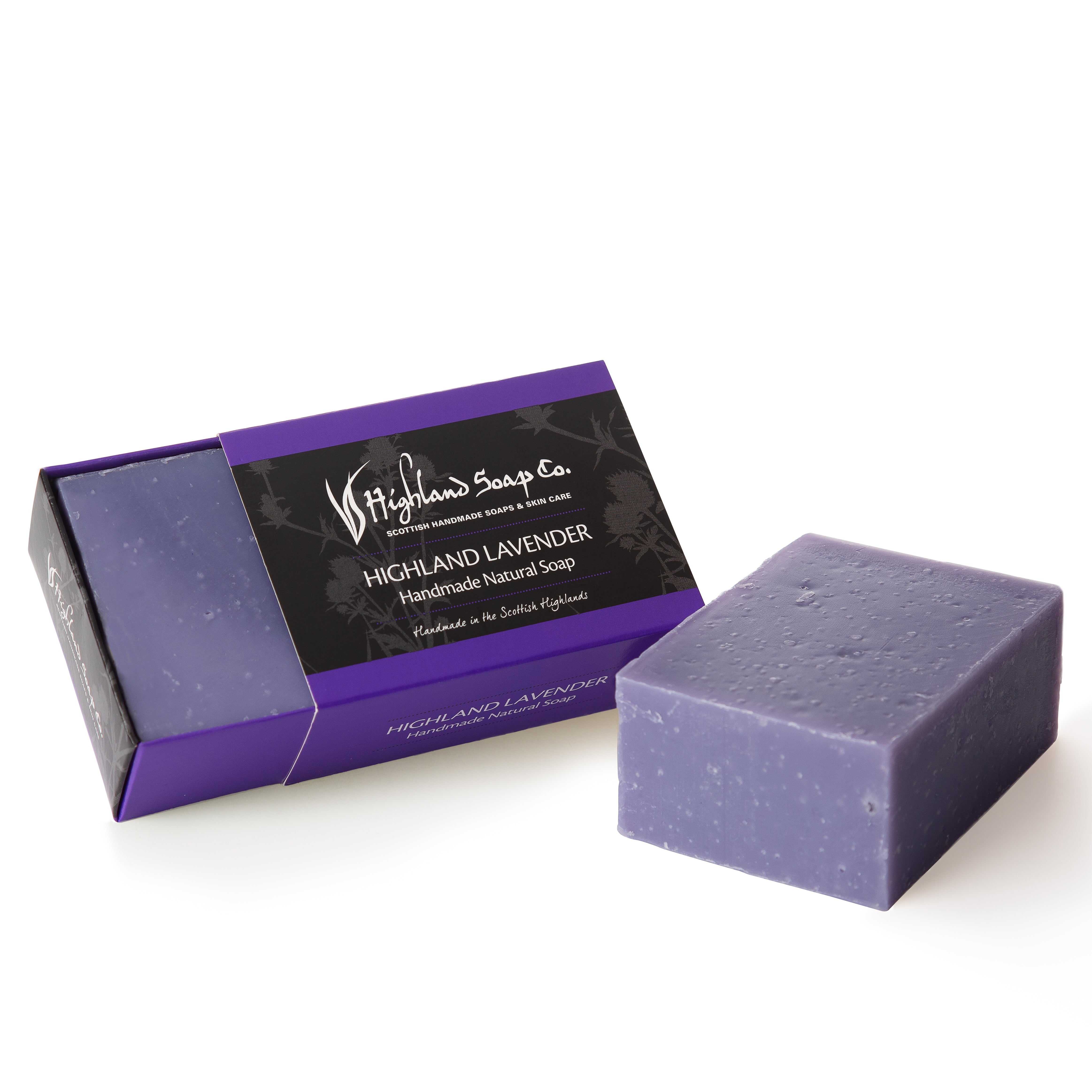 Purple soap bar with packaging labeled 'Highland Lavender' on a white background
