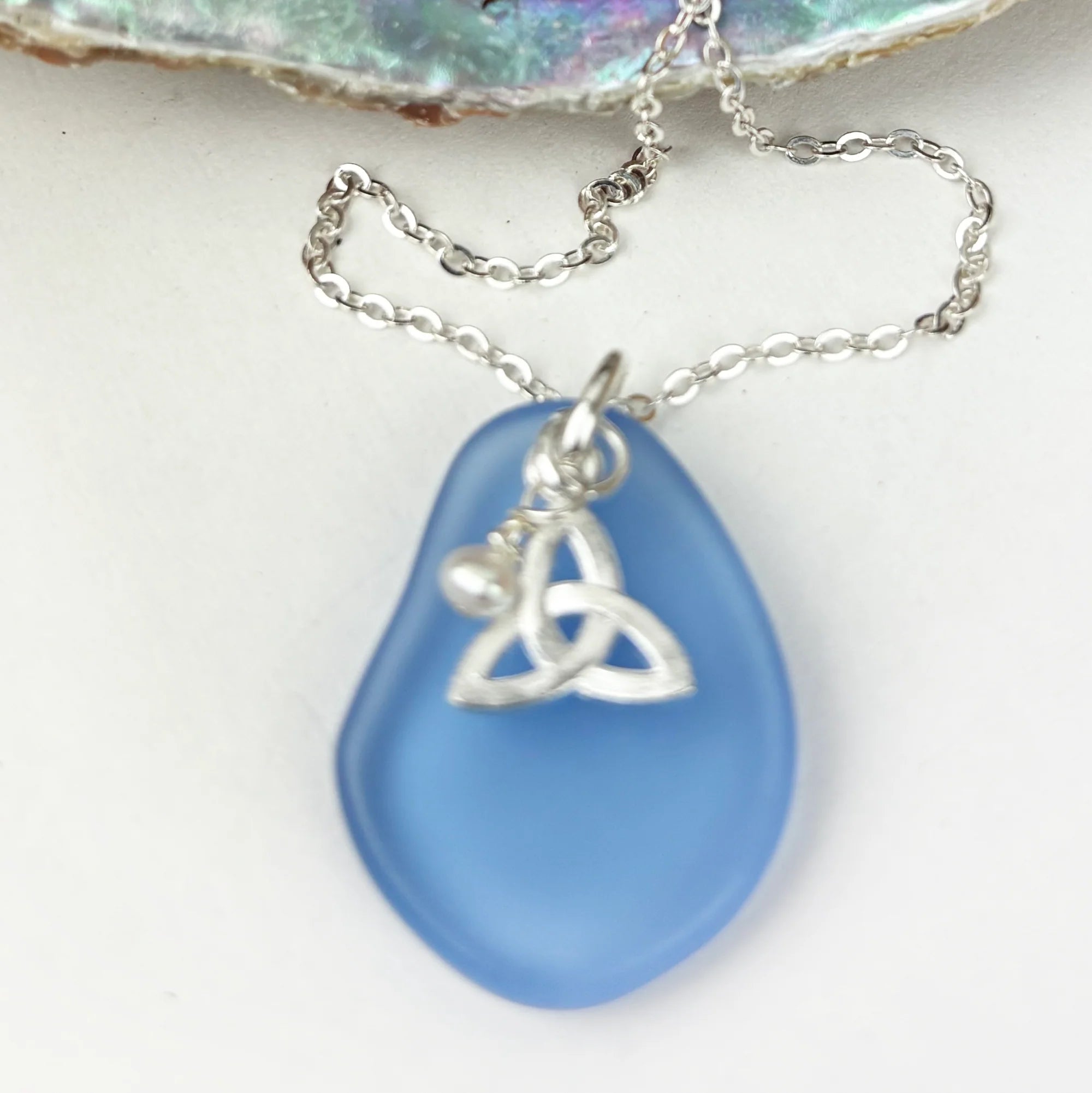Ocean blue sea glass trinity knot pendant