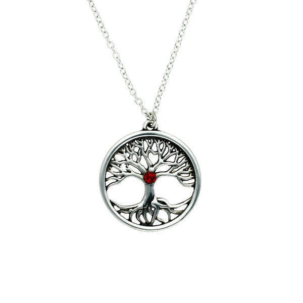 Silver tree of life pendant with a red gemstone on a white background