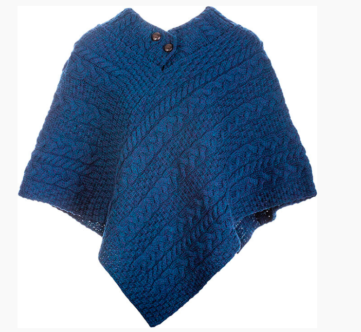 Blue knitted poncho on a white background