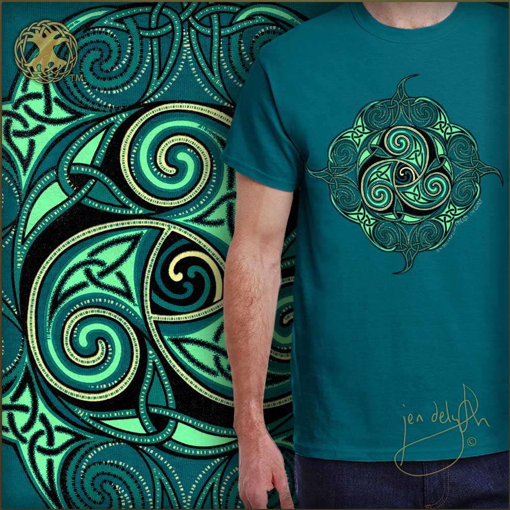 Teal t-shirt with intricate green and black Celtic design, featuring a signature, against a decorative background.