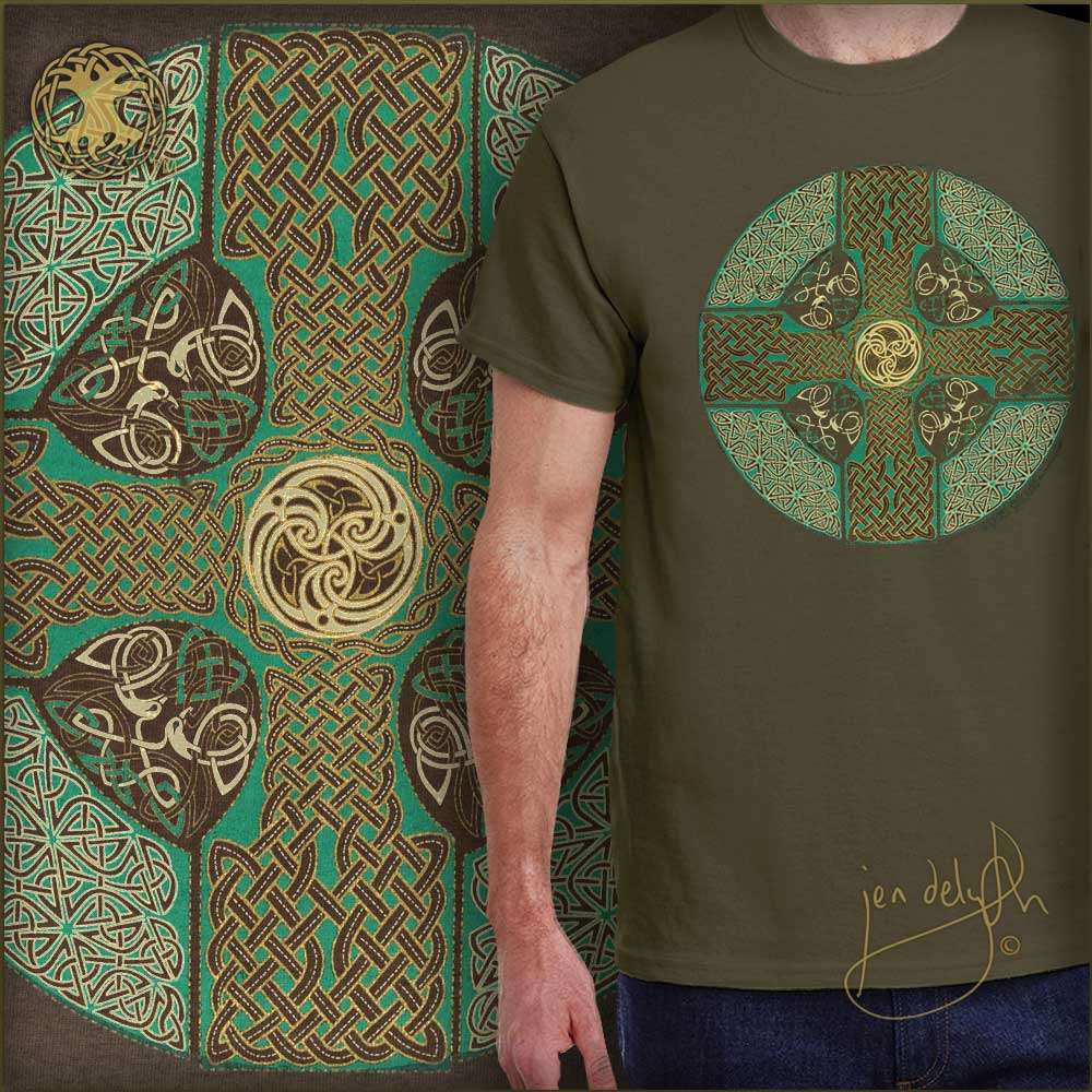 Person wearing a green t-shirt with Celtic cross design in front of a detailed Celtic cross artwork.