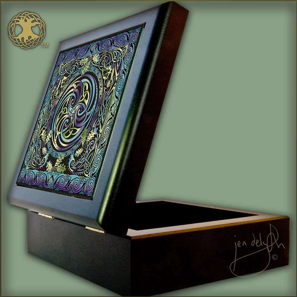 Decorative box with intricate design on a light green background