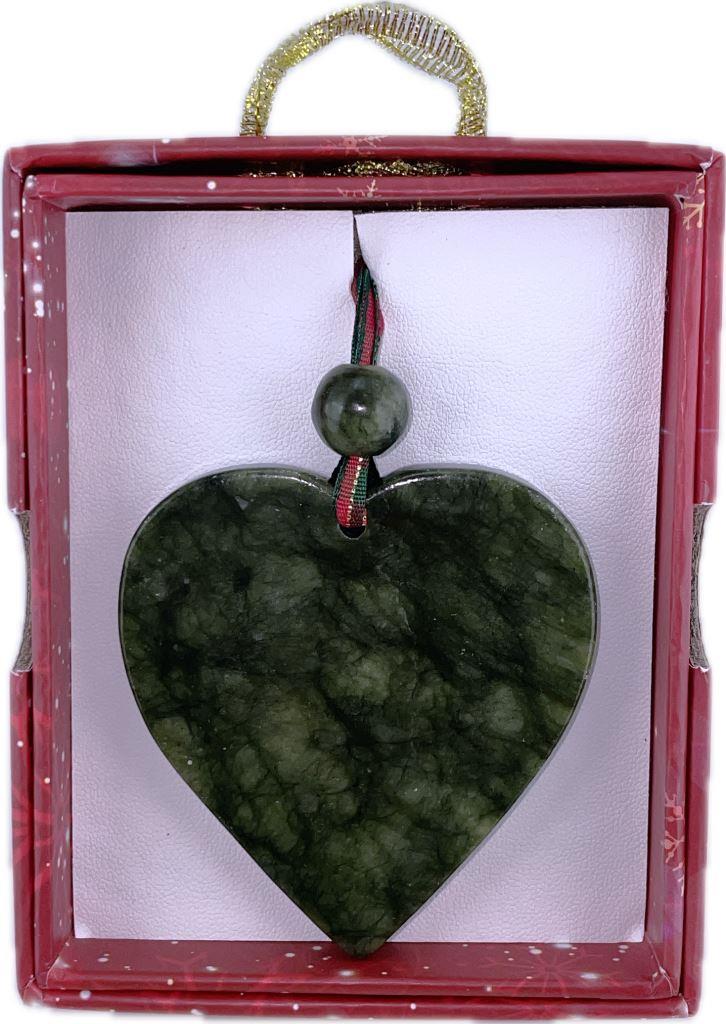 Green marble heart-shaped ornament with a bead in a red box