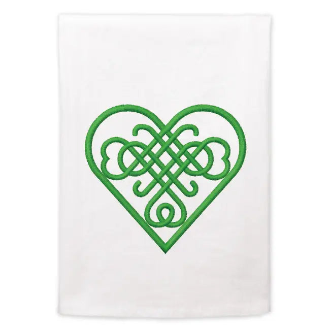 White towel with a green Celtic heart design on a white background