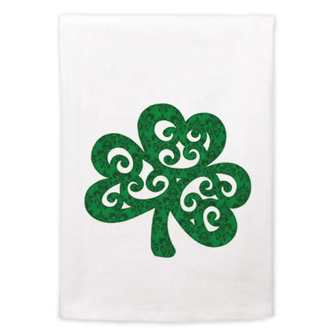 Decorative green shamrock design tea towel on a white background
