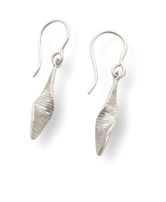 Pair of silver leaf-shaped earrings on a white background