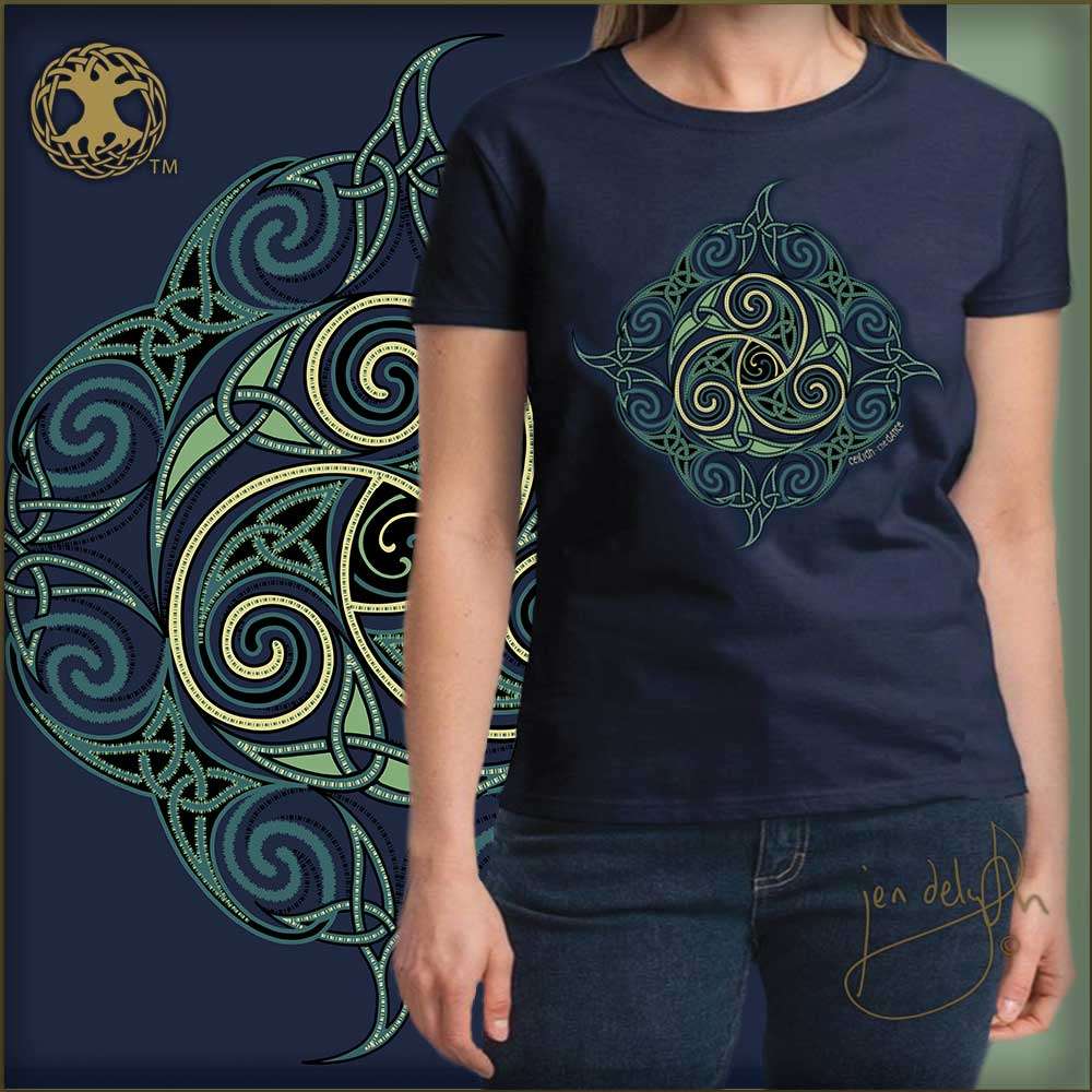 Navy blue t-shirt with green and gold Celtic knot design worn by a person, with a decorative background featuring similar patterns.
