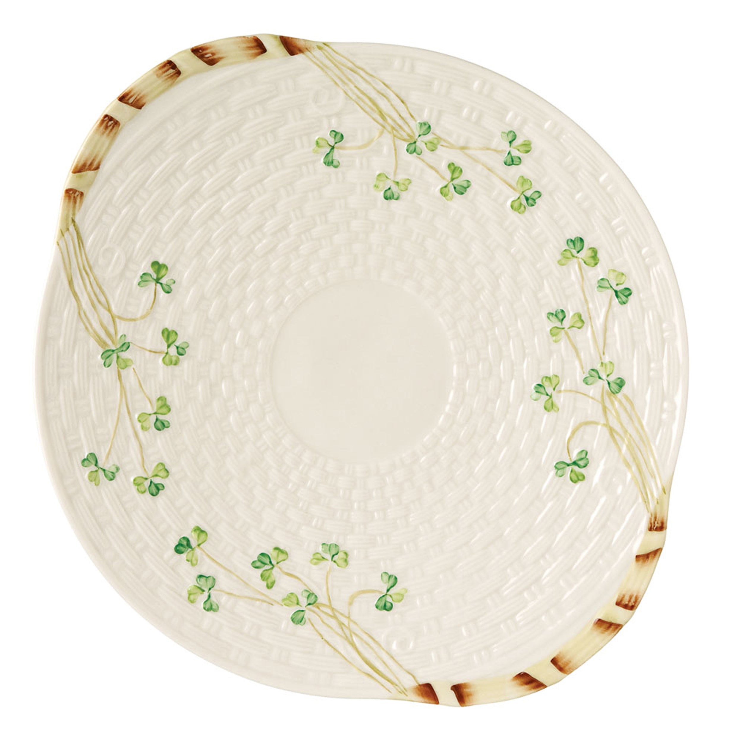 Round ceramic plate with decorative green patterns on a white background