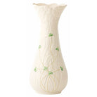 White vase with green floral patterns on a white background