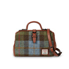 Chestnut Blue Plaid bag with brown leather straps on a white background
