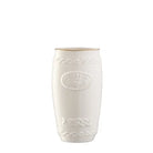 White ceramic vase with decorative patterns on a white background