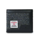 Harris Tweed wallet with a visible brand label on a white background