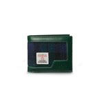 Blackwatch tartan wallet with a brand label on a white background