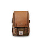 Brown leather backpack with woven pattern on a white background