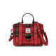 Red plaid handbag with leather accents on a white background