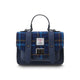 Blue plaid handbag with leather straps on a white background