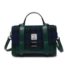 Green and blue checkered handbag with a visible brand label on a white background