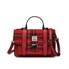 Red plaid handbag with leather straps on a white background