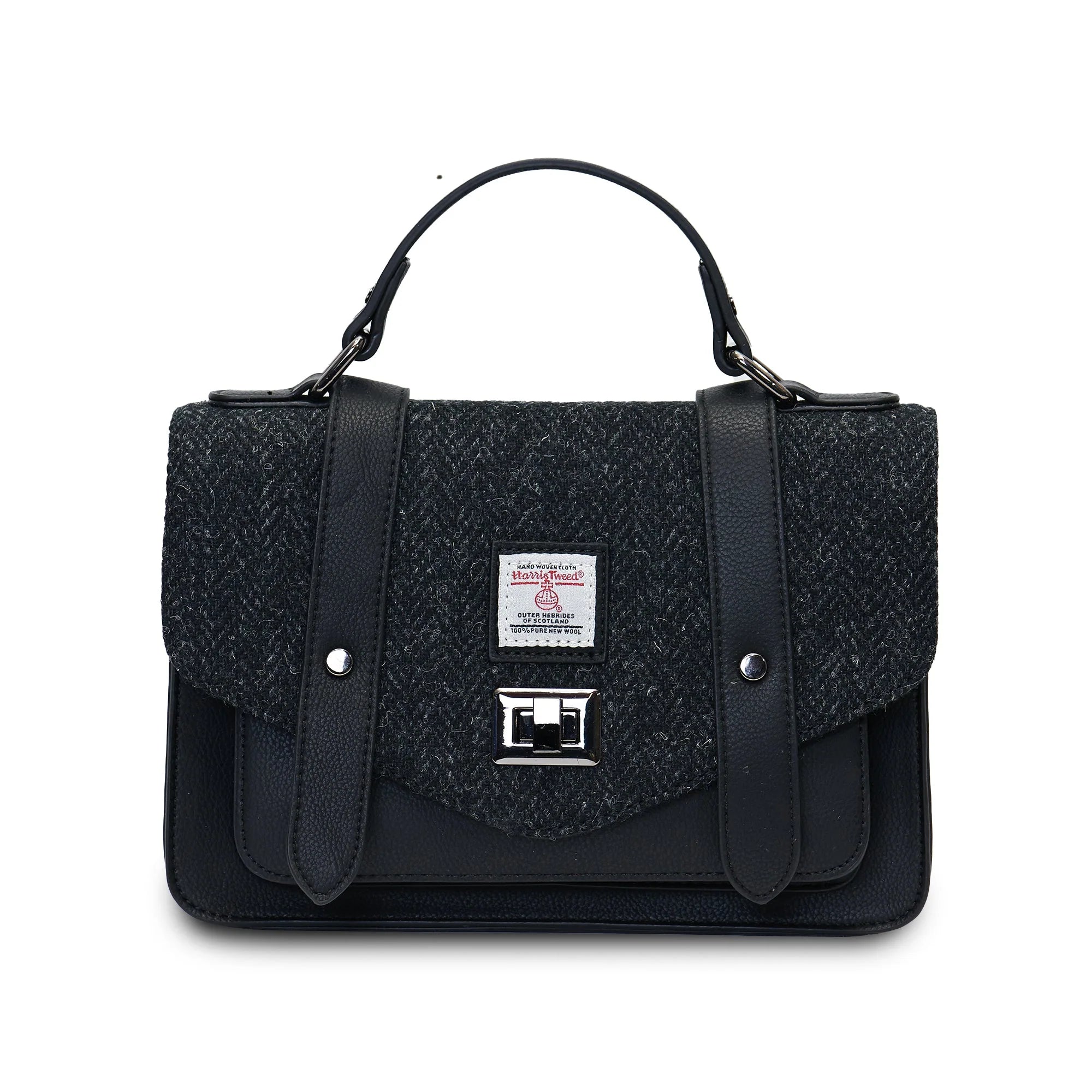 Black textured handbag with a strap on a white background