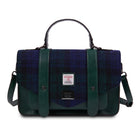 Green and blue checkered bag with a visible brand label on a white background