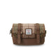 Brown leather and plaid fabric bag with a visible brand label on a white background