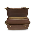Brown leather handbag with gold zipper and hardware on a white background