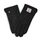 Pair of dark gray gloves with a brand label on a white background