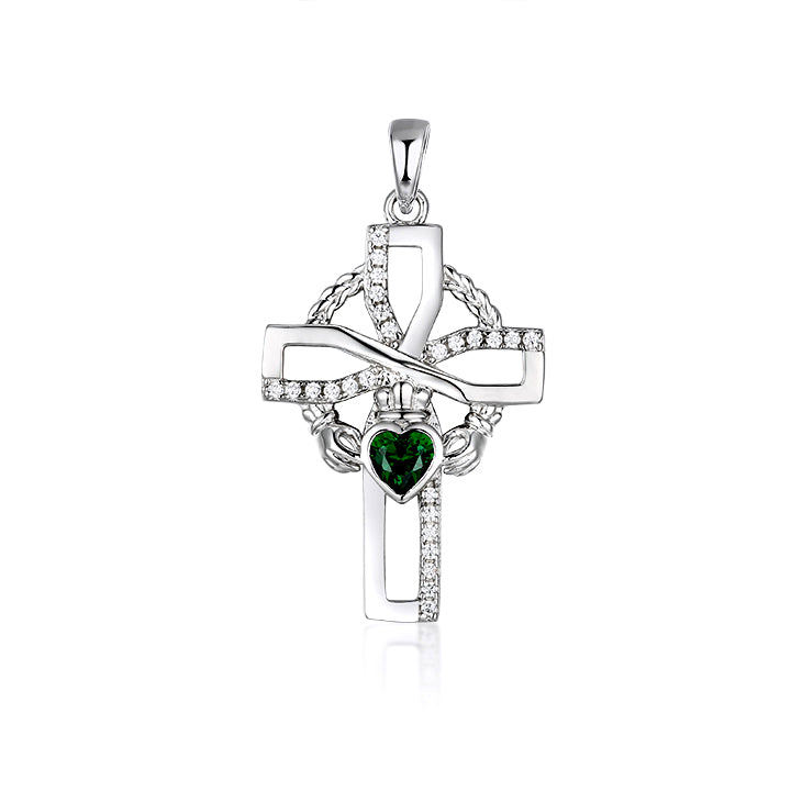 Silver Celtic cross & Claddagh pendant with a green heart stone on a white background