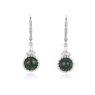 Pair of silver earrings with green gemstones on a white background
