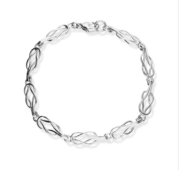 Silver bracelet with Celtic links on a white background