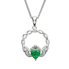 Silver pendant with green gemstone on a white background