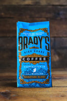 Brady's coffee package on a wooden surface with a rustic background