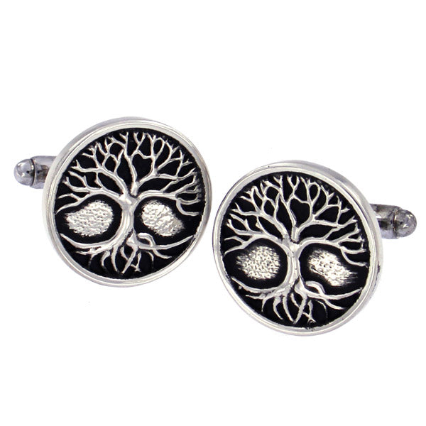 Tree of life cufflinks on a white background