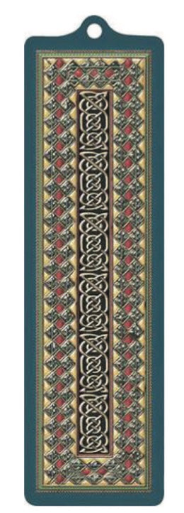 Decorative rectangular mat with intricate patterns on a blue background