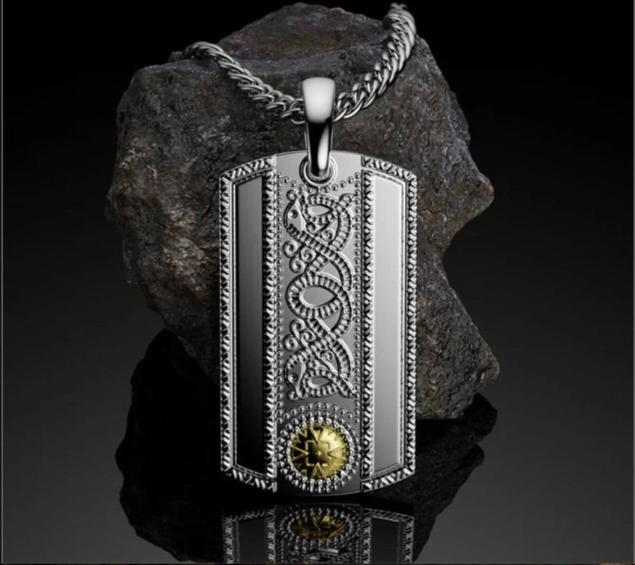Silver pendant with celtic warrior intricate design on a dark background