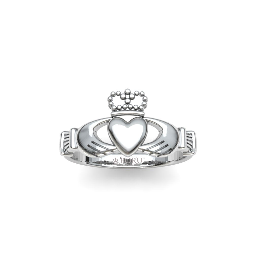 Silver claddagh ring with a heart design on a white background