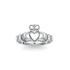 Silver claddagh ring with a heart design on a white background