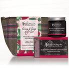 Highland Soap Co. gift set with cream, soap, and pouch on a white background