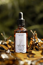Facial oil bottle with dropper labeled 'WASI on a natural background.  Irish Seaweed infused oil.