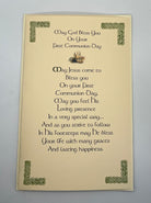 First Communion blessing card with decorative text and design on a plain background
