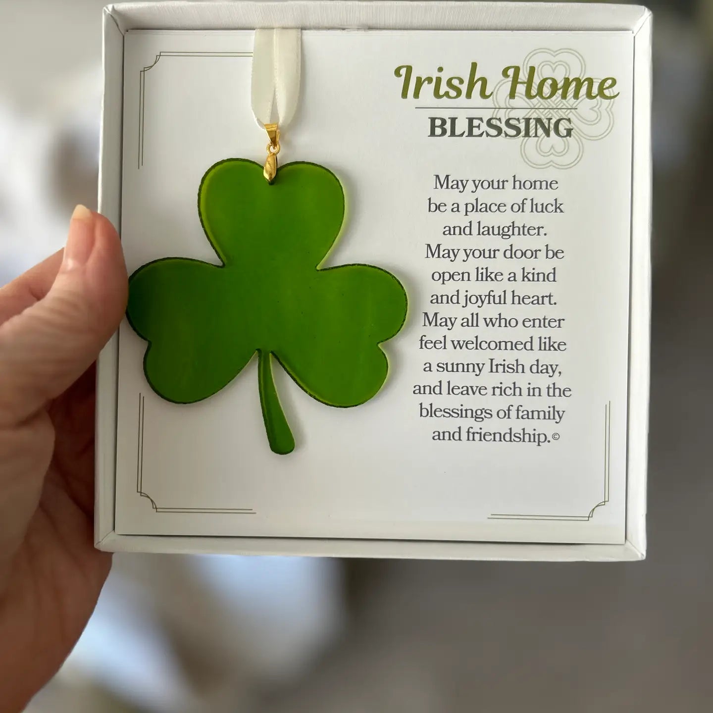 Green shamrock ornament with 'Irish Home Blessing' text on a white background