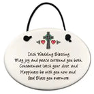 Decorative plaque with Irish wedding blessing text and cross design on a white background
