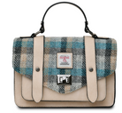 A structured satchel handbag with a beige faux-leather body, a teal and gray plaid patterned flap, and a top handle, shown on a plain white background.
