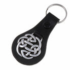 Keychain with Celtic knot design on a black leather strap against a white background