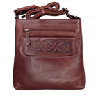 Brown leather crossbody bag with Celtic knot design on a white background