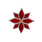 Red poinsettia brooch yellow center on a white background